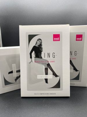 Gambaletto a compressione graduata MEDI Swing Classic a punta chiusa colore naturale e nero.
